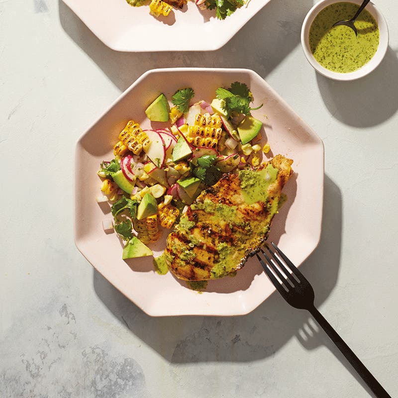 Coriander chicken with avocado and corn salad
