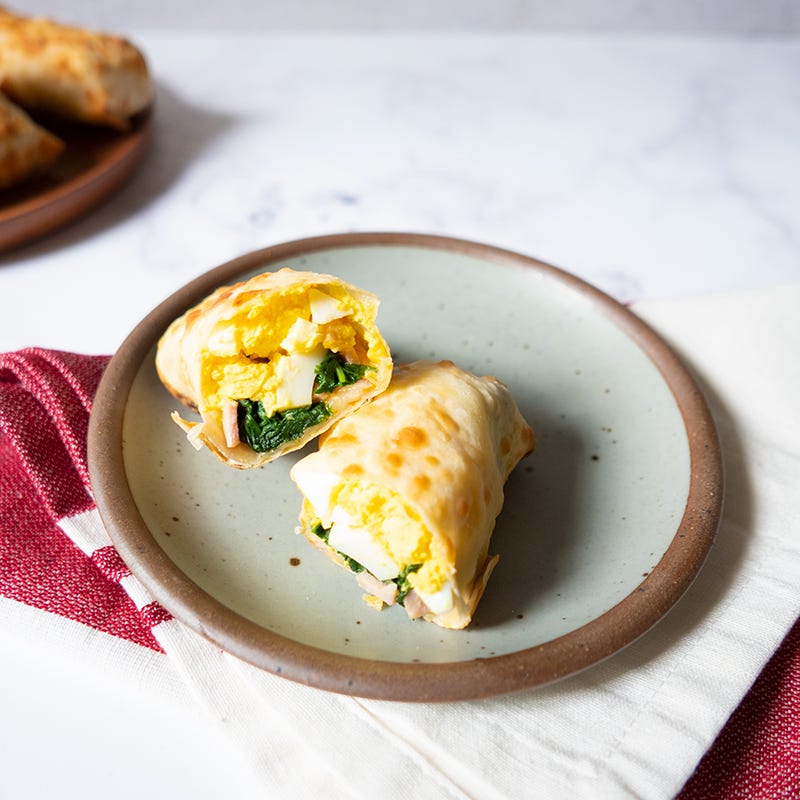 Photo of Breakfast Egg Rolls with Spinach & Canadian Bacon by WW