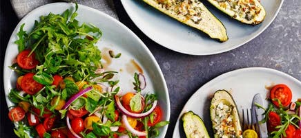 Cheese & herb stuffed zucchini with arugula salad