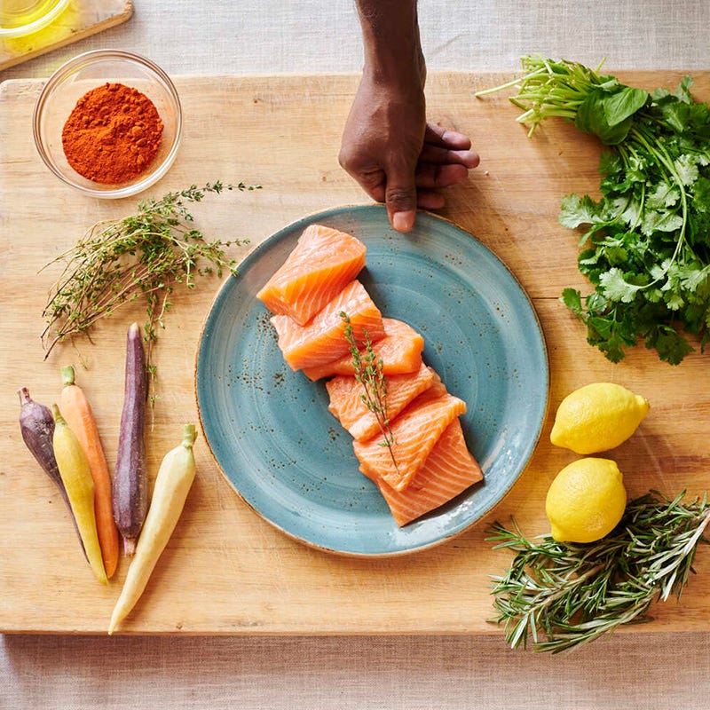 Photo of Steamed Salmon with Herb Salad, Spiced Carrots & Caramelized Brussels by Chef Marcus Samuelsson by WW