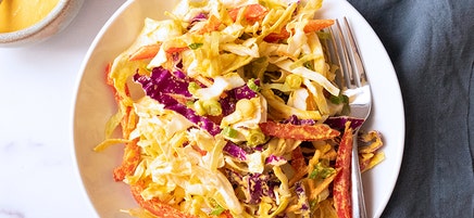 Vegan cabbage salad with carrot-ginger dressing