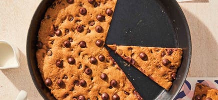 Grilled peanut butter-chocolate chip skillet cookie