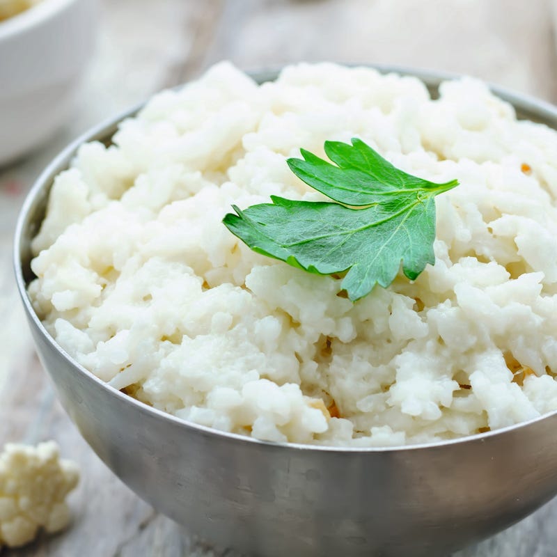 Foto van Geroerbakte bloemkoolrijst met doperwten en ei door WW
