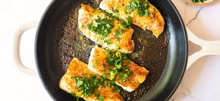 Grilled cast-iron skillet cod fillets