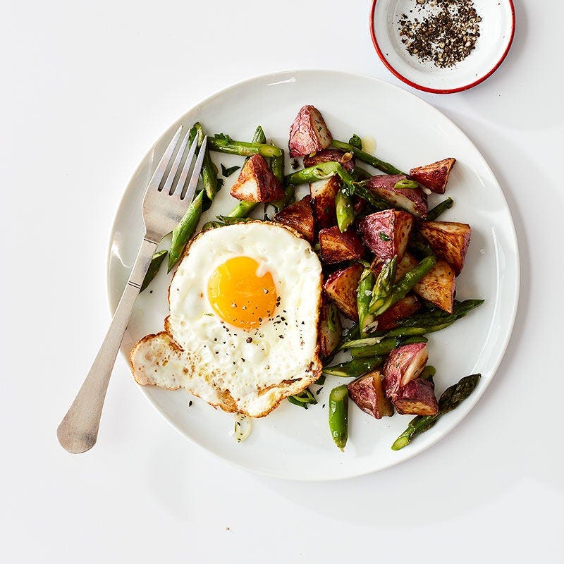 Photo of Fried Egg with Asparagus-Potato Hash by WW