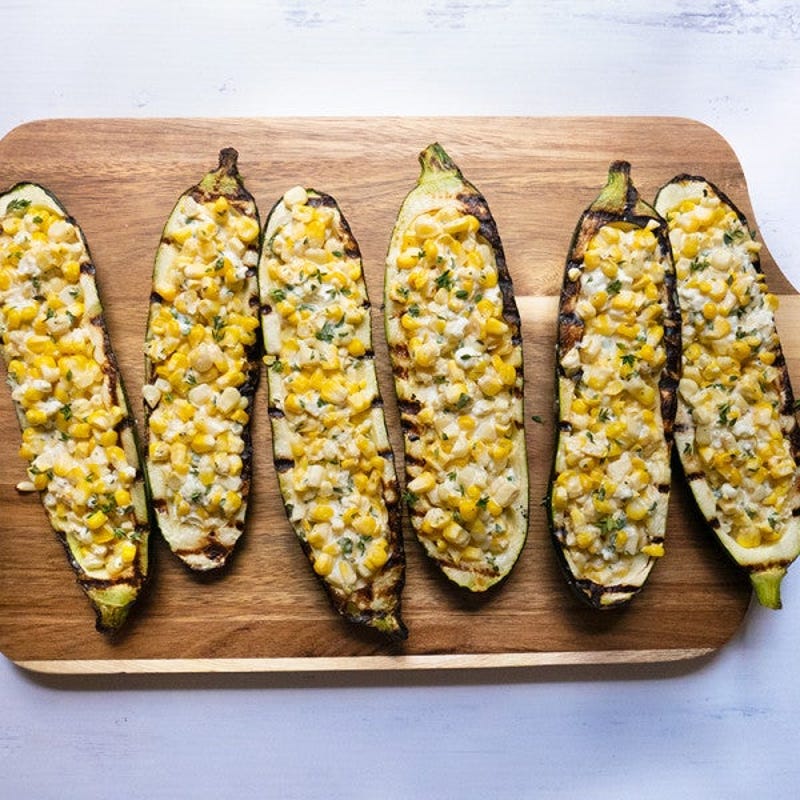Photo of Grilled zucchini boats stuffed with corn and herbs by WW