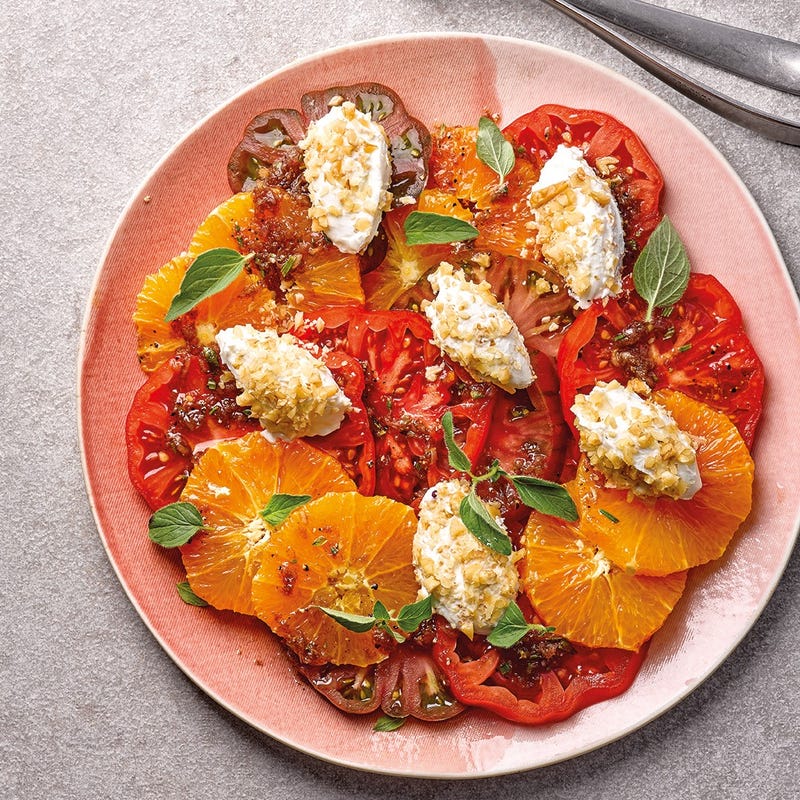 Carpaccio de tomates et d'oranges au fromage de chèvre