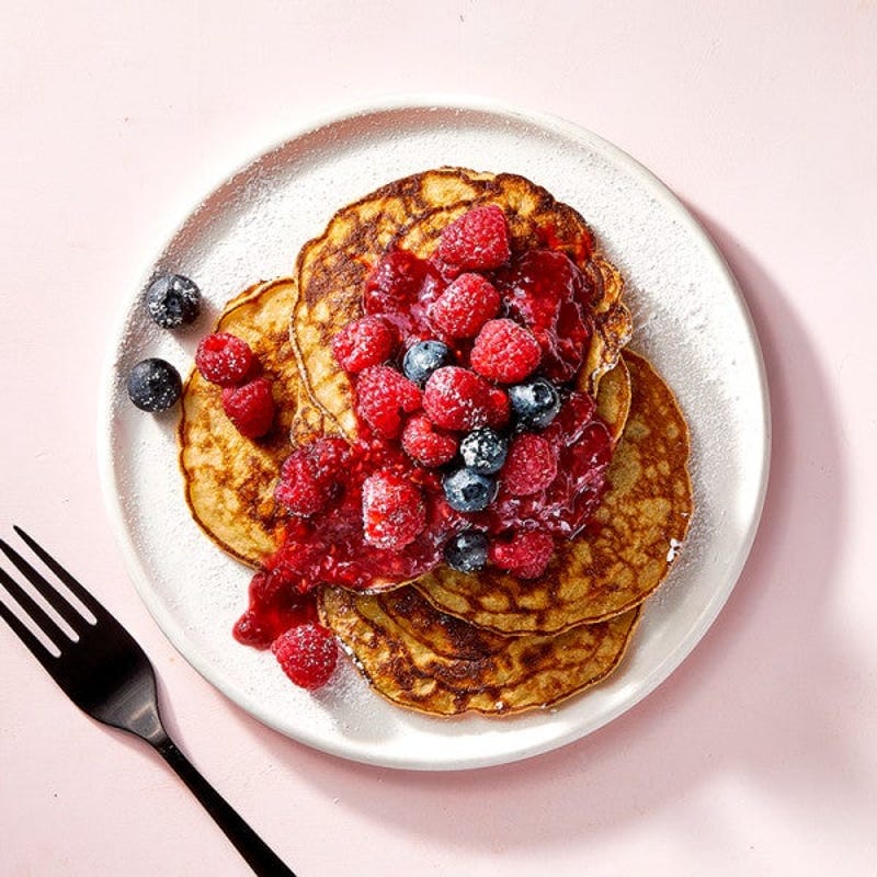 Photo of 3-Ingredient banana pancakes with fresh berries by WW