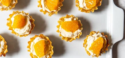 Creamy orange cheesecake tartlets