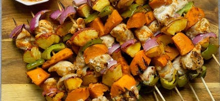 BBQ chicken skewers with peaches and sweet potatoes