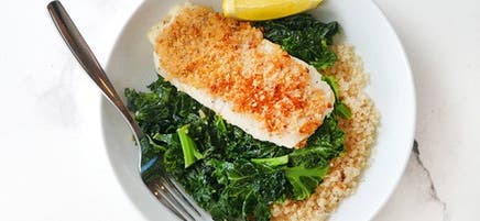 Panko-coated cod with garlicky greens & quinoa