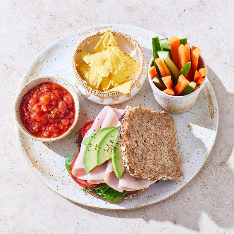 Photo of Turkey & avocado sandwich with chips and crudités by WW