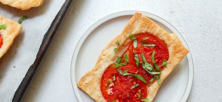 Upside-down tomato-cheese tarts