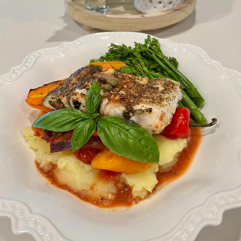 roasted barramundi in white wine with veg and mash potatoes